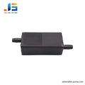 Mini air pump silencer with two hose ports, side view