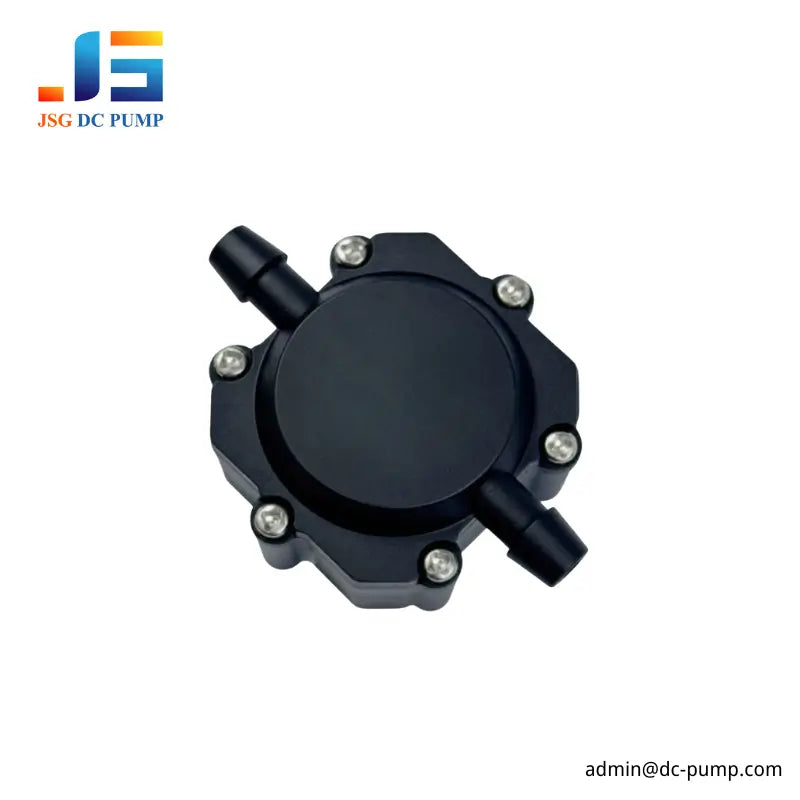 JSG miniature pulse dampener with two hose ports, angled view